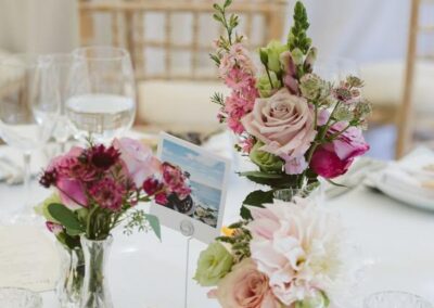 Fulham Palace rose table set up with photo stand